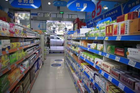 Shelves displaying medicines are seen at a pharmacy in Shanghai, China, November 27, 2015. REUTERS/Aly Song