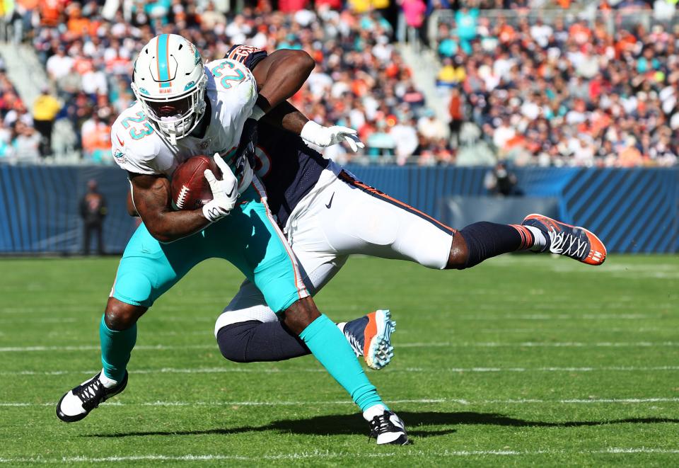 Four days after being obtained by the Dolphins, Jeff Wilson led them in rushing with 51 yards against the Bears.