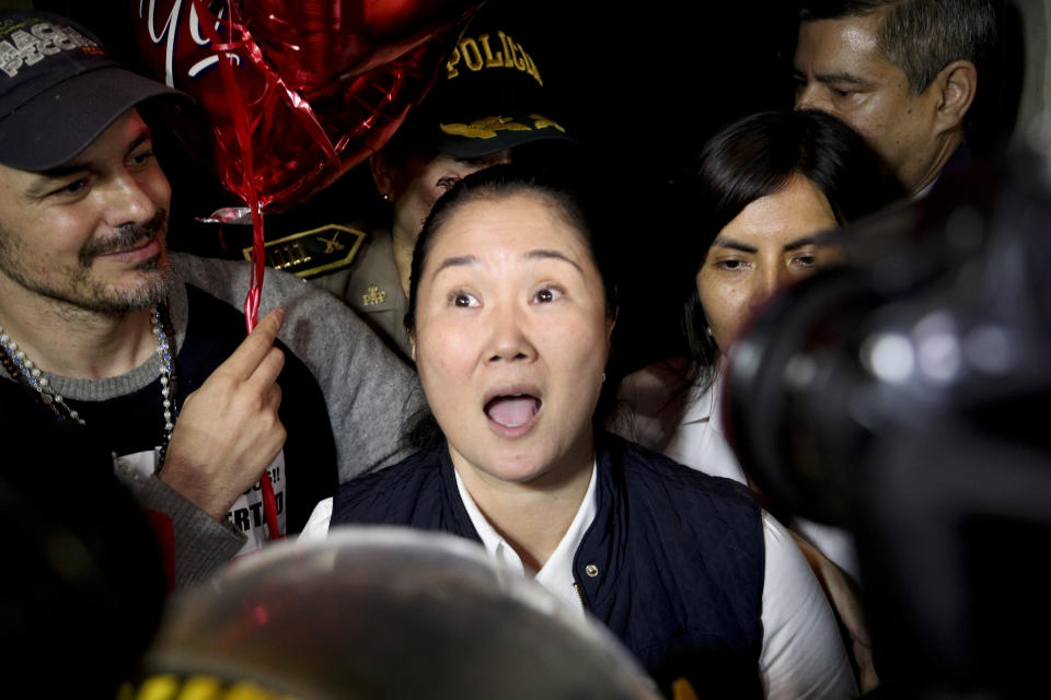 Keiko Fujimori leaves the Santa Mónica women's prison in Lima, Peru, Friday, Nov. 29, 2019. The Constitutional Tribunal narrowly approved a habeas corpus request to free Fujimori from detention while she is investigated for alleged accusations she accepted money from Brazilian construction giant Odebrecht.(AP Photo/Martin Mejia)