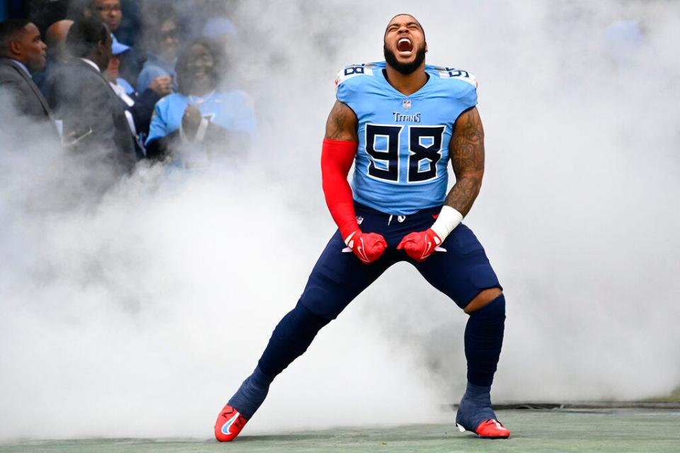 Tennessee Titans defensive tackle Jeffrey Simmons (98) runs onto the field before a game against the Cincinnati Bengals on Nov. 27, 2022, in Nashville, Tenn.