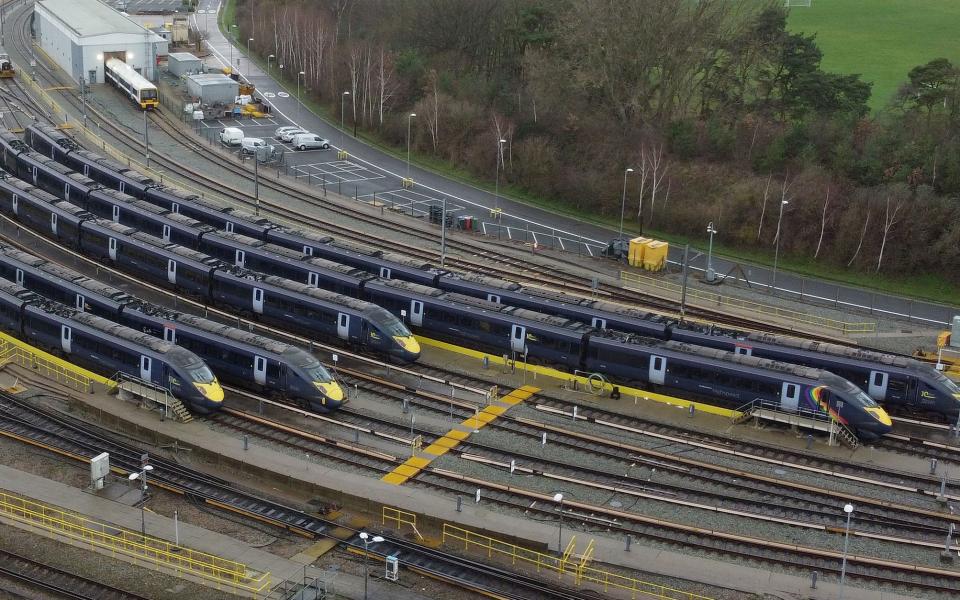 High speed trains sit in sidings at Ashford International Station, Kent following service cancellations