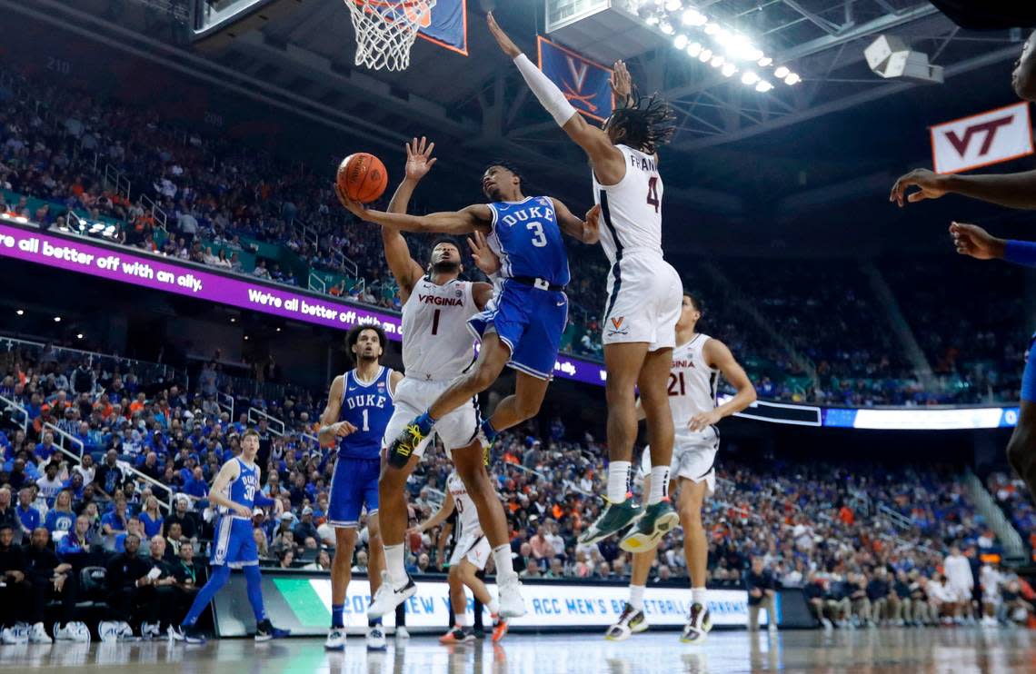 Duke’s Jeremy Roach (3) drives to the basket past Virginia’s Armaan Franklin (4) and Jayden Gardner (1) during Duke’s 59-49 victory over Virginia to win the ACC Men’s Basketball Tournament in Greensboro, N.C., Saturday, March 11, 2023.