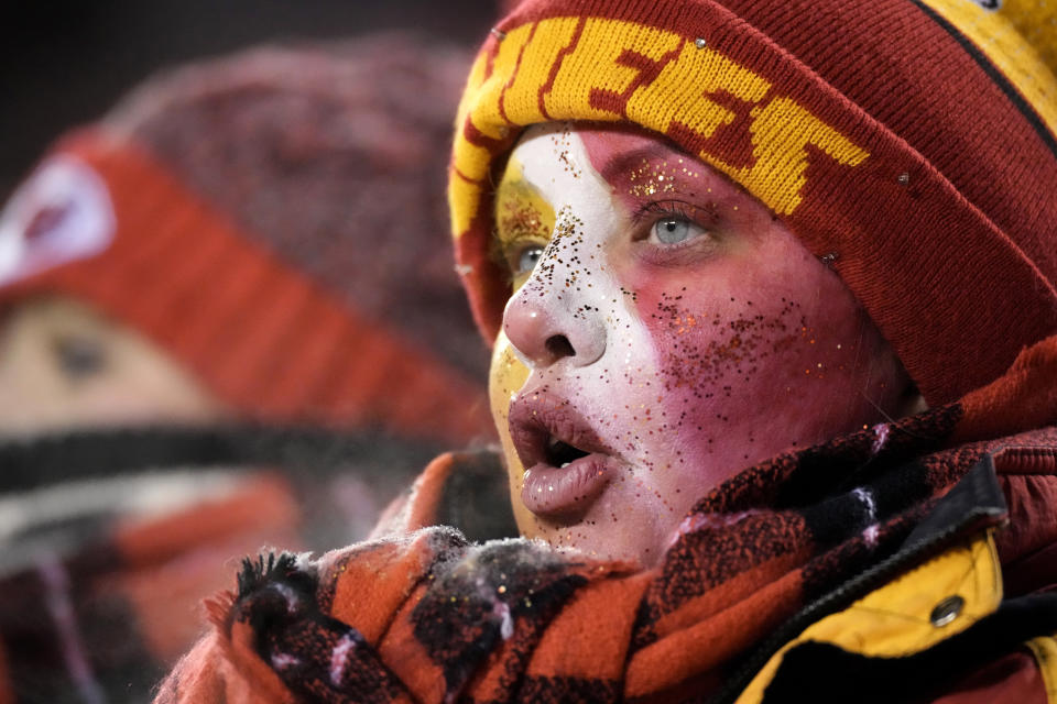 Kansas City Chiefs fans watch during the second half of an NFL wild-card playoff football game between the Chiefs and the Miami Dolphins on Saturday, Jan. 13, 2024, in Kansas City, Mo. (AP Photo/Charlie Riedel)