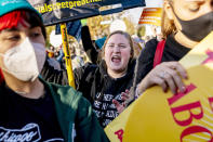 An anti-abortion protester yells at abortion rights advocates as they demonstrate in front of the U.S. Supreme Court, Wednesday, Dec. 1, 2021, in Washington, as the court hears arguments in a case from Mississippi, where a 2018 law would ban abortions after 15 weeks of pregnancy, well before viability. (AP Photo/Andrew Harnik)