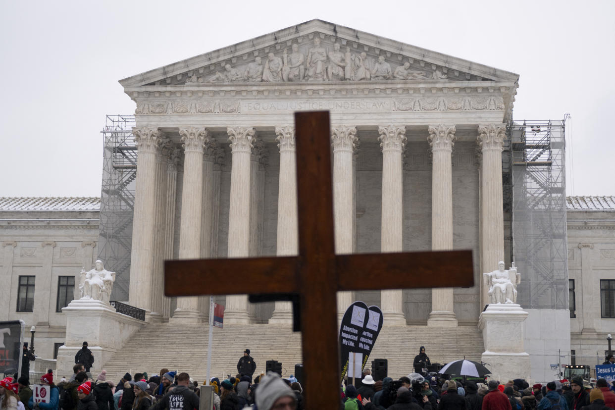  Demonstrators holds a cross during in the March For Life anti-abortion rally in front of the US Supreme Court in Washington, DC on January 19, 2024. 
