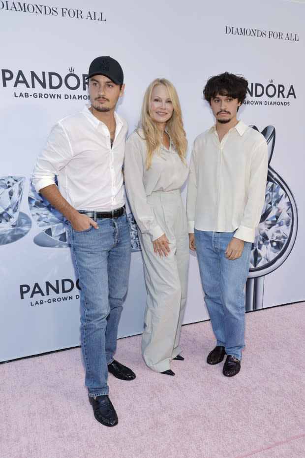 NEW YORK, NEW YORK - SEPTEMBER 06: (L-R) Brandon Lee, Pamela Anderson, Dylan Lee attend as Pandora Celebrates Lab Grown Diamonds With A New Diamond District on September 06, 2023 in New York City. (Photo by Mike Coppola/Getty Images for Pandora)<p>Mike Coppola/Getty Images</p>