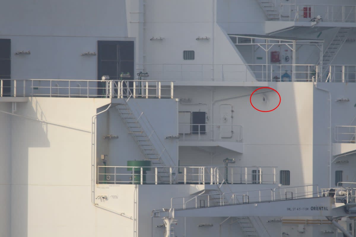 Damage sustained by M/T Richmond Voyager after an Iranian naval vessel fired multiple rounds from, during an attempt to unlawfully seize the commercial tanker in the Gulf of Oman (US Department of Defense/AFP via)