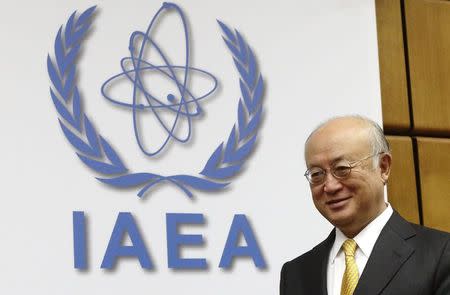 International Atomic Energy Agency (IAEA) director general Yukiya Amano arrives for a board of governors meeting at the IAEA headquarters in Vienna December 11, 2014. REUTERS/Heinz-Peter Bader