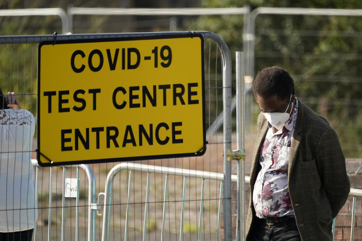 BOLTON, ENGLAND - SEPTEMBER 17: People queue at a walk in Covid-19 testing centre on September 17, 2020 in Bolton, England. Fears about rising infection rates among younger people across the Uk has forced the government into tighter lockdown restrictions, particularly in the North of England.  (Photo by Christopher Furlong/Getty Images)