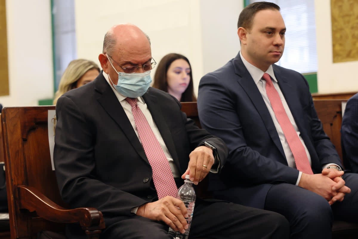 Former Trump Organization Executive Allen Weisselberg (L) sits in the courtroom during the civil fraud trial of former President Donald Trump (Getty Images)