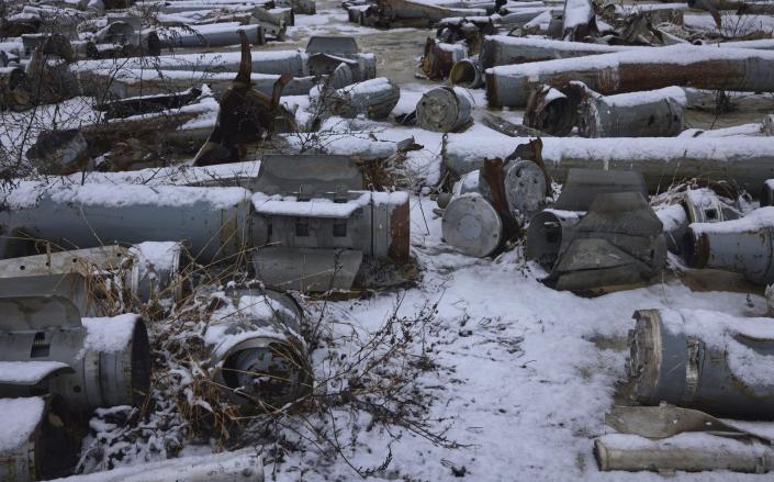 Spent Russian munitions lie collected in a field at an undisclosed location on February 27, 2023 in Kharkiv - Alex McBride/Getty Images Europe