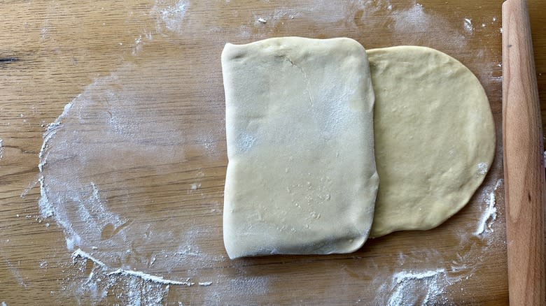 folding dough on counter