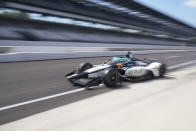 Fernando Alonso, of Spain, pulls out of the pits during a practice session for the Indianapolis 500 auto race at Indianapolis Motor Speedway, Friday, Aug. 14, 2020, in Indianapolis. (AP Photo/Darron Cummings)