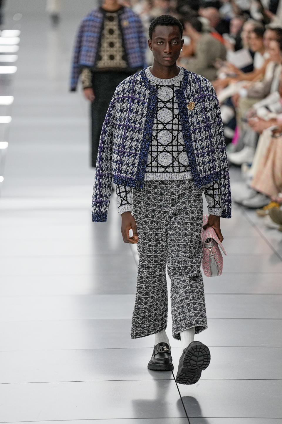 A model wears a creation for the Dior Menswear Spring/Summer 2024 fashion collection presented in Paris, Friday, June 23, 2023. (AP Photo/Michel Euler)