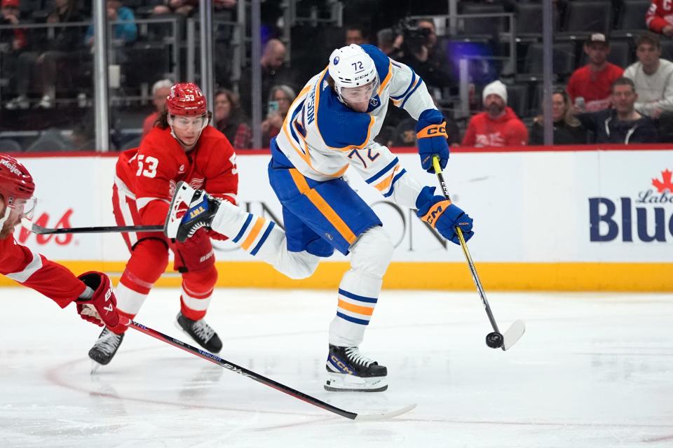 Buffalo Sabres right wing Tage Thompson (72) shoots as Detroit Red Wings' Moritz Seider (53) defends in the second period at Little Caesars Arena in Detroit on Saturday, March 16, 2024.