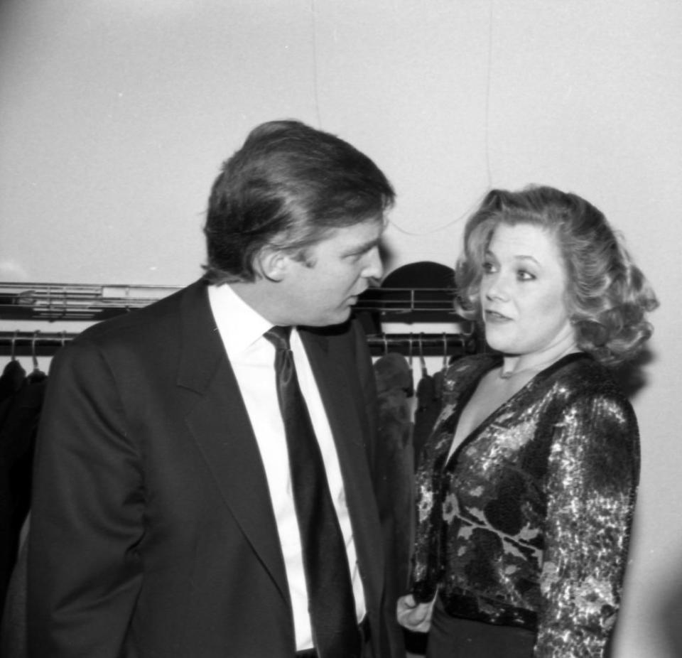 Donald Trump and Kathleen Turner talk at New York City’s Lincoln Center Library in February 1988. (Photo: Tom Gates/Getty Images)