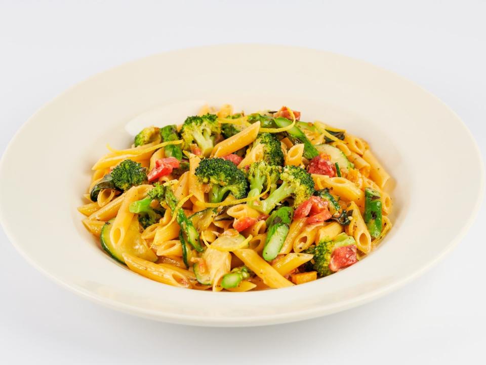 Evelyn's Favorite Pasta Broccoli, Zucchini, Asparagus, Peppers, Tomato, Onion, Garlic and Fresh Herbs. Tossed with Parmesan