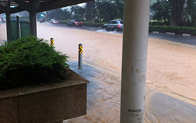 Bus stops are affected by the flash floods. (Photo from Twitter)