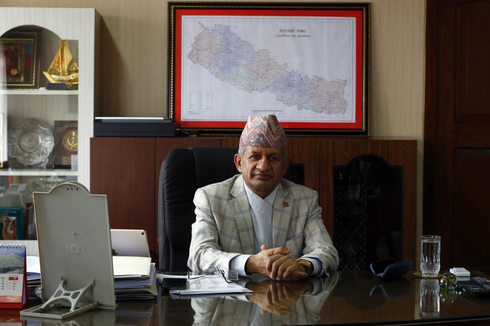 Nepal’s foreign minister Pradeep Gyawali poses during an interview with the Associated Press in Kathmandu, Nepal, Tuesday, June 9, 2020. Gyawali said Tuesday that the country was still waiting for a response from India on holding talks to resolve a border dispute that has strained relations between the South Asian neighbors. (AP Photo/Niranjan Shrestha)