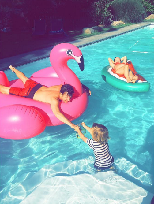 Jason Sudeikis and Olivia Wilde As the couple readies for baby number two, they prove that they have the parenting thing down as they leisurely relax on floats (a flamingo for him; a watermelon for her) while Otis (safely) hangs on the pool stairs. (Photo: Instagram) 