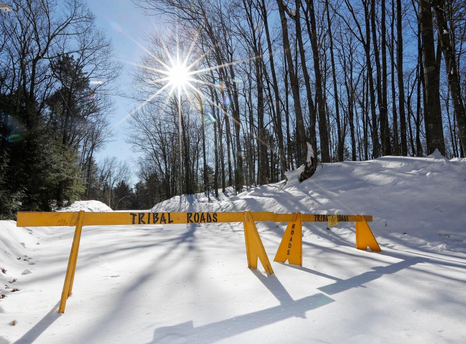 A roadblock is seen on Wednesday, February 8, 2023, along Elsie Lake Lane in Lac du Flambeau, Wis. A special town board meeting was held to receive public comment and deliberate over the town’s course of action in response to Lac du Flambeau reservation tribal officials erecting barricades along four roads in the area. Tribal officials set up barricades on the roads Jan. 30 after negotiations with property title companies that built the roads and the homes they access broke down. Tribal officials say the roads were illegally built on tribal lands and the tribe was not compensated for the right-of-way easements.Tork Mason/USA TODAY NETWORK-Wisconsin 