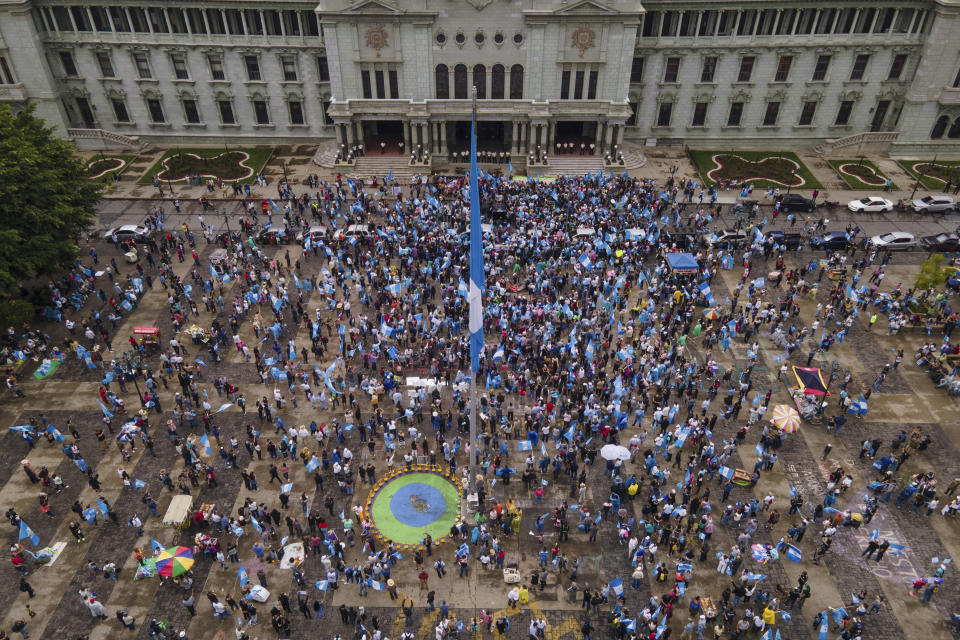 People gather against the legal actions taken by the Attorney General's office against the Seed Movement party and President-Elect Bernardo Arévalo, at the Constitutional Square in Guatemala City, Saturday, Sept. 2, 2023. Guatemala's Congress has declared the Seed Movement's seven lawmakers — one of whom is Arévalo — independents, which bars them from holding leadership positions. (AP Photo/Moises Castillo)