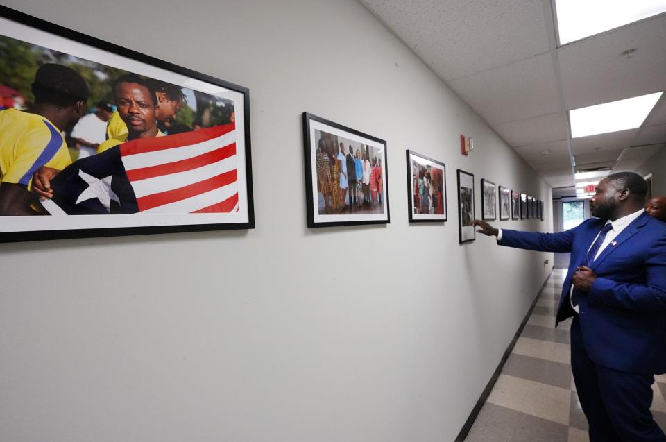 Alpha Tongor, executive director of Liberians in Columbus, Inc., gives a tour of the space the organization started renting in July. The location is adjacent to the land the nonprofit owns where it wants to built a community center.