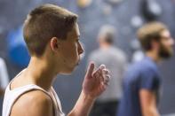 Drew Ruana, 16, a competitive climbing national champion, trains at Stone Gardens rock climbing gym in Bellevue, Washington October 20, 2015. REUTERS/Jason Redmond