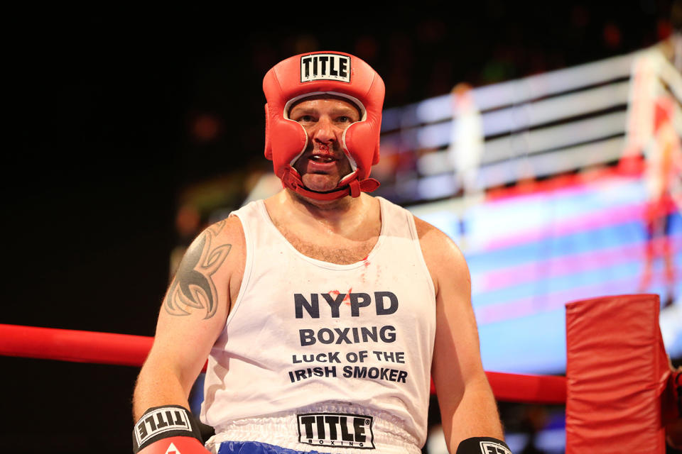 <p>Vincent Trozzi awaits in the neutral corner during the NYPD Boxing Championships at the Theater at Madison Square Garden on June 8, 2017. (Photo: Gordon Donovan/Yahoo News) </p>