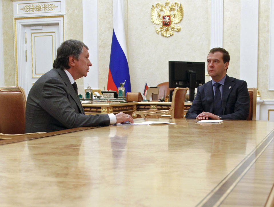 Russian Prime Minister Dmitry Medvedev, right, meets with Igor Sechin, appointed as CEO of state-controlled Russian oil company Rosneft, in Moscow, Tuesday, May 22, 2012. (AP Photo/RIA-Novosti, Dmitry Astakhov, Presidential Press Service)