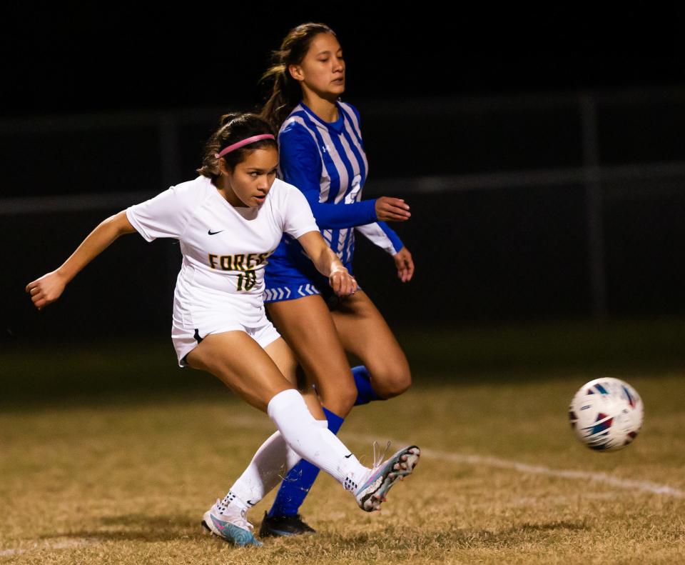 Forest's Janellie Castro knocks in a goal against Belleview in early January.