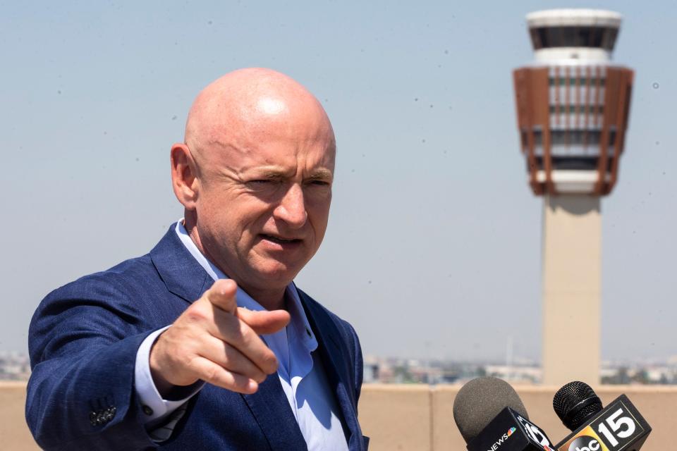 Senator Mark Kelly visits Phoenix Sky Harbor International Airport to view the construction of the airport's new concourse and discuss his Senate work on bipartisan infrastructure proposals, July 1, 2021. Benjamin Chambers/The Republic