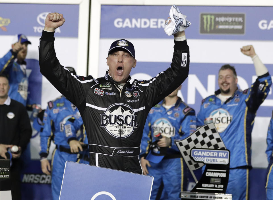 Kevin Harvick celebrates in Victory Lane after winning the first of two qualifying auto races for the NASCAR Daytona 500 at Daytona International Speedway, Thursday, Feb. 14, 2019, in Daytona Beach, Fla. (AP Photo/John Raoux)