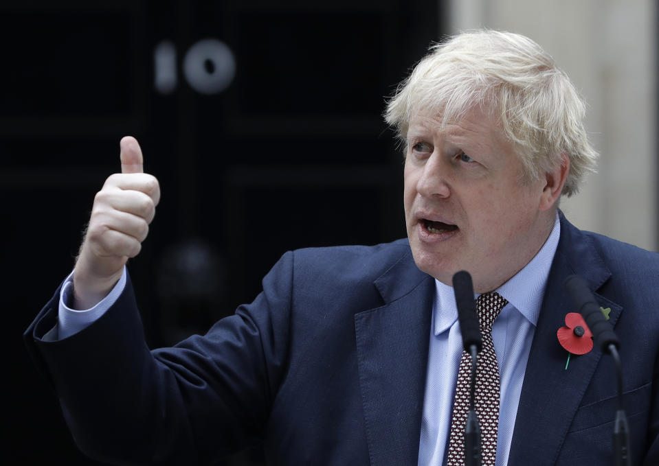 Britain's Prime Minister Boris Johnson speaks in Downing Street, London, on Wednesday, Nov. 6, 2019, ahead of the formal start of the General Election. Britain's five-week election campaign officially began Wednesday, when Parliament was dissolved ahead of the Dec. 12 vote. (AP Photo/Kirsty Wigglesworth)