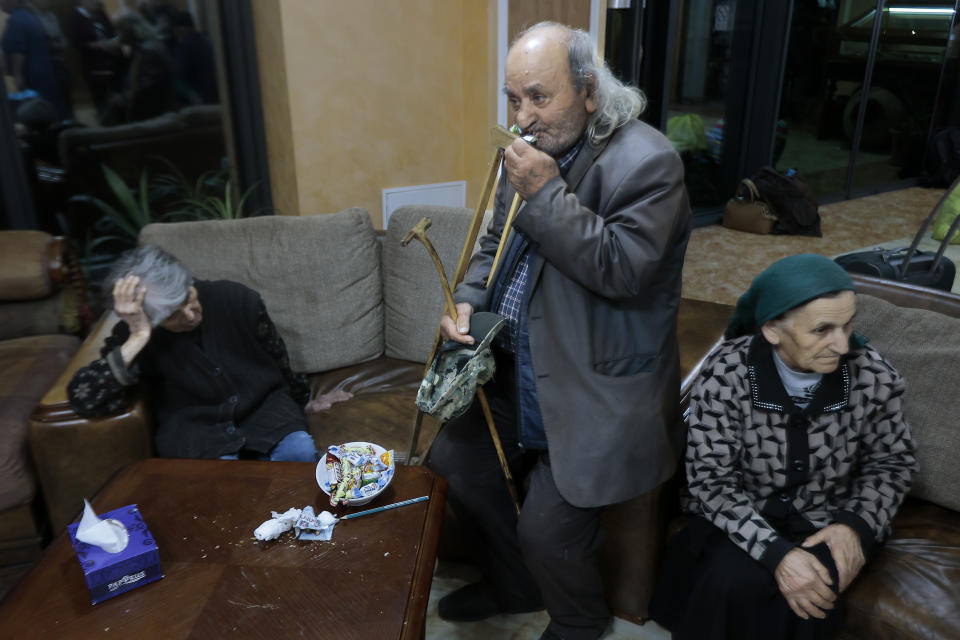 FILE - Ethnic Armenians from the first group of about 30 people from Nagorno-Karabakh wait to be temporarily checked into a hotel in Goris, the town in Syunik region, Armenia, Sept. 24, 2023. Thousands of Nagorno-Karabakh residents are fleeing their homes after Azerbaijan's swift military operation to reclaim control of the breakaway region after a three-decade separatist conflict. (AP Photo/Vasily Krestyaninov, File)