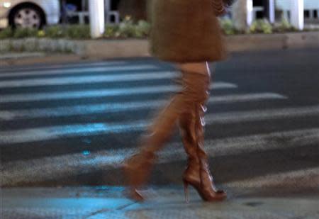 A prostitute from Eastern Europe waits for customers along the Promenade des Anglais in Nice, November 29, 2013. REUTERS/Eric Gaillard