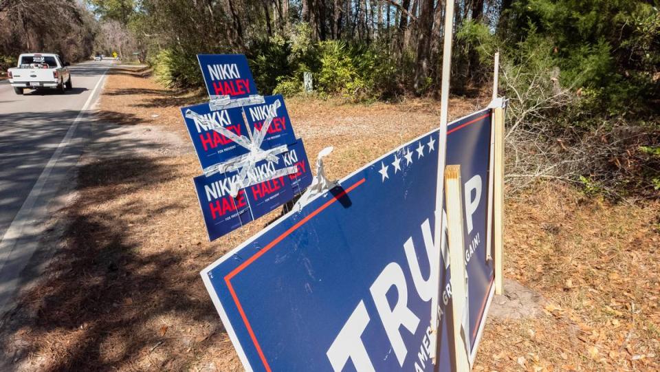 Political signs stacked along Ulmer Road greet voters as they arrive to Precinct 3 at the Bluffton Recreation Center Gymnasium during the GOP Presidential primary for Nikki Haley and Donald Trump in Bluffton.