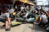 Mercedes Lewis Hamilton has his tyres changed during third practice at the Circuit de Catalunya, Barcelona.