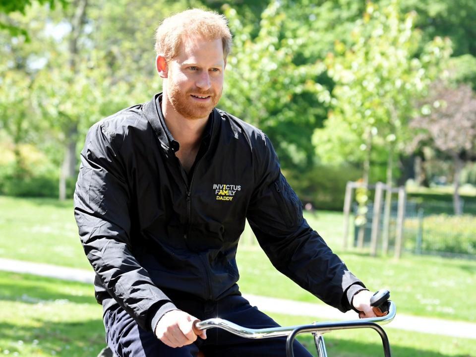 prince harry on a bicycle