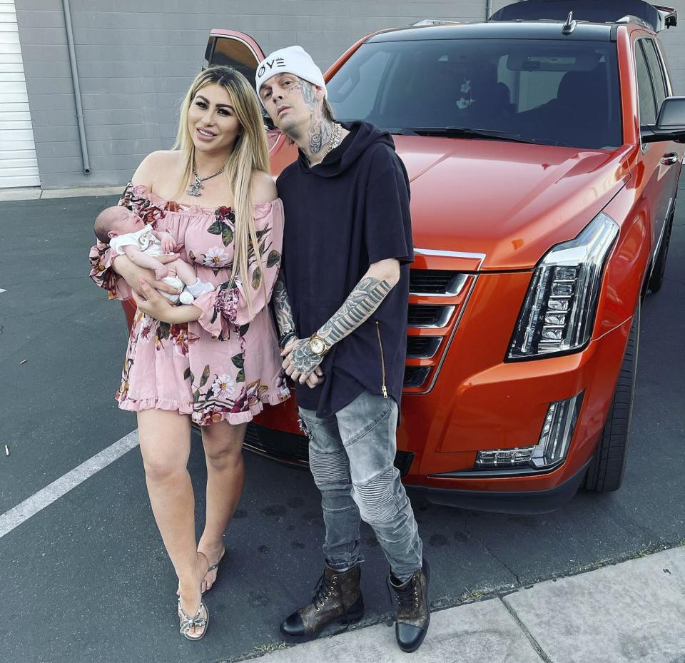 Melanie Martin and Aaron Carter with their baby