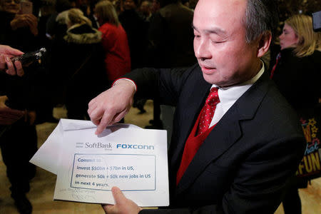 Softbank CEO Masayoshi Son speaks to the press after meeting with U.S. President-elect Donald Trump at Trump Tower in Manhattan, New York City, U.S., December 6, 2016. REUTERS/Brendan McDermid