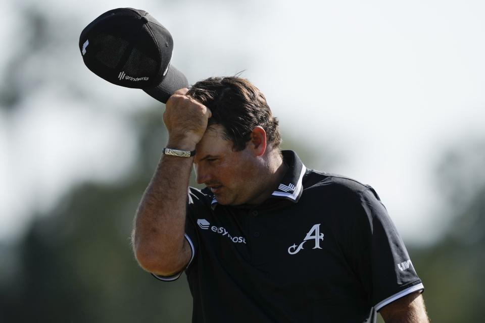 Patrick Reed reacts after missing a putt on the 18th hole during final round at the Masters golf tournament at Augusta National Golf Club Sunday, April 14, 2024, in Augusta, Ga. (AP Photo/David J. Phillip)