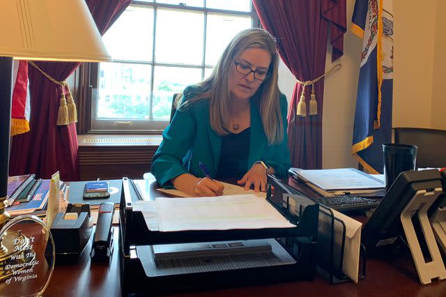 <p>Courtesy of the Wexton Office</p> Rep. Jennifer Wexton at work in her congressional office before her health challenges