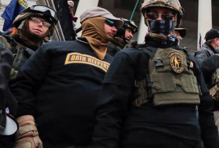 Jason Dolan, center, at the Capitol on Jan. 6, 2021. (U.S. District Court for the Southern District of Florida)