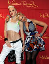 Who's who? "That is so weird," the No Doubt rocker told friends when her ab-tastic look-alike was revealed in September 2011 at Madame Tussauds, inside The Venetian hotel in Las Vegas. "I can't believe it."