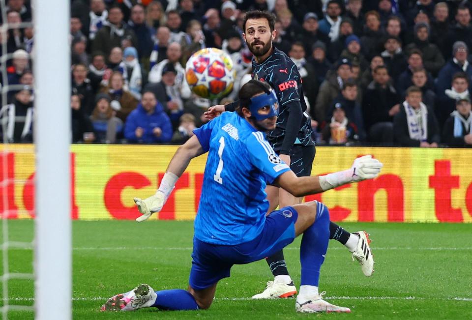 <span>Bernardo Silva restores Manchester City’s lead by tucking the ball past Kamil Grabara.</span><span>Photograph: Matthew Childs/Action Images/Reuters</span>