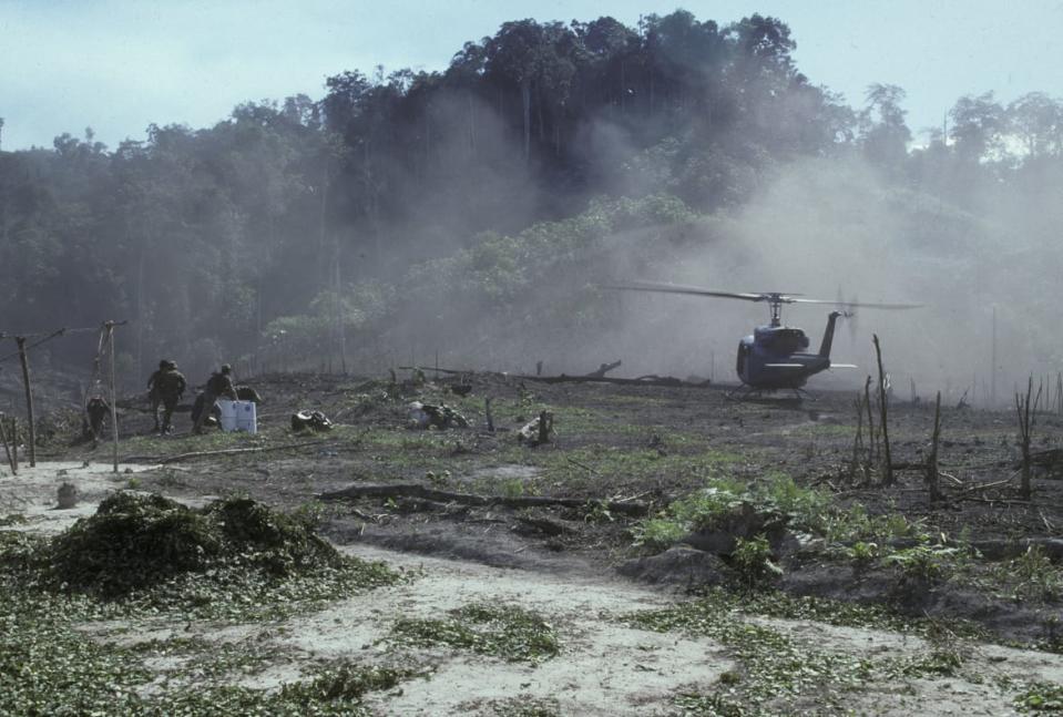 <div class="inline-image__caption"><p>Specially trained U.S. Drug Enforcement agents and Peruvian special anti-narcotics police attack and destroy cocaine paste processing plants in the Huallagua Valley from a base in Tingo Maria, Peru in the 1980s.</p></div> <div class="inline-image__credit">Greg Smith/Corbis via Getty Images</div>