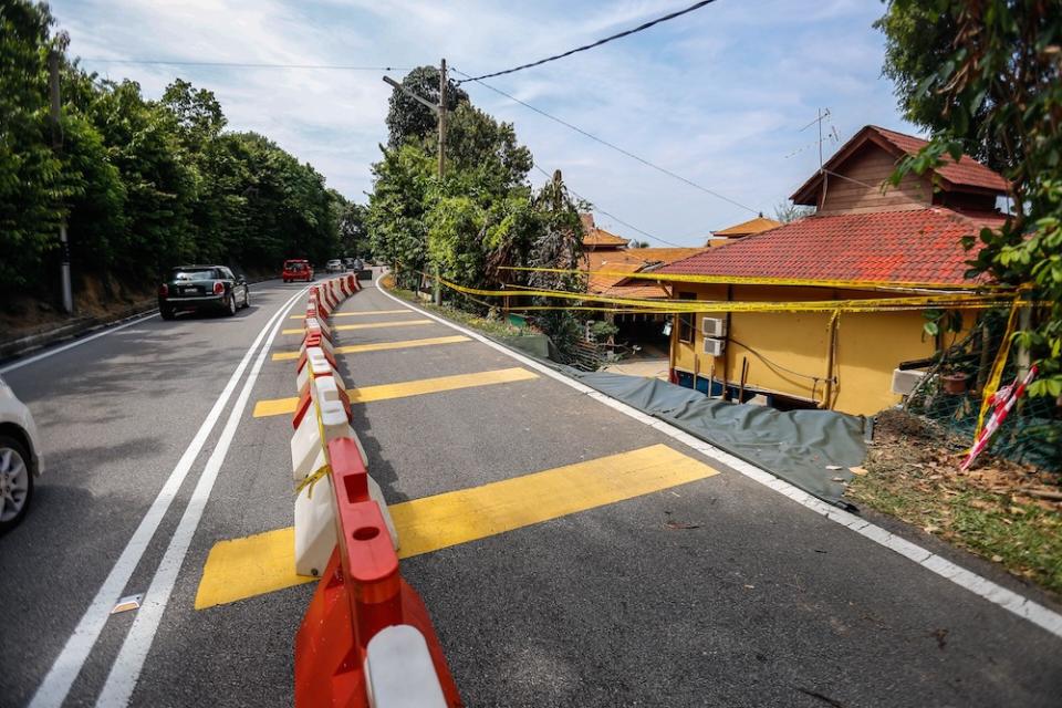 General view of the cordoned-off site of the landslide in Tanjung Bungah June 26, 2019. — Picture by Sayuti Zainudin