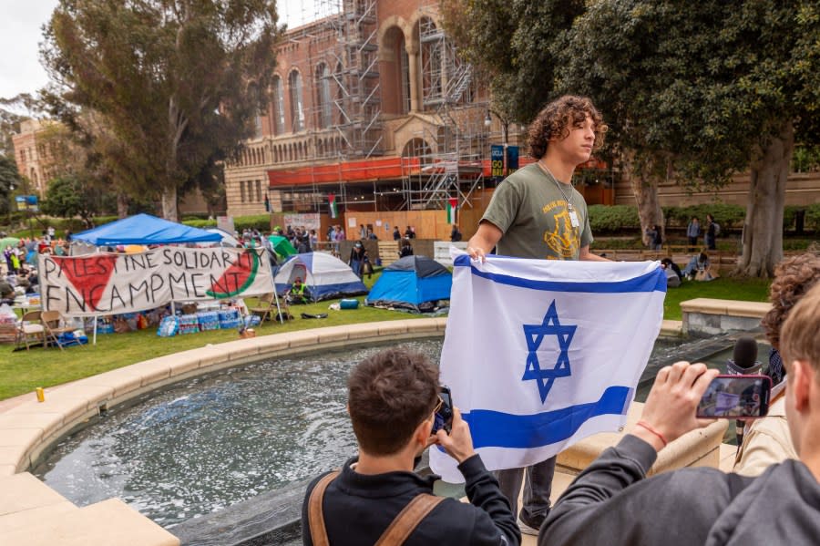 LOS ANGELES, CALIFORNIA – APRIL 25: A demonstrator protest during the pro-Palestine student encampment at the University of California, Los Angeles in solidarity with Palestinian people, in Los Angeles, California, United States on April 25, 2024. (Photo by Grace Yoon/Anadolu via Getty Images)