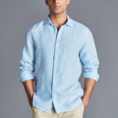 Man wearing pure linen strip shirt in light blue